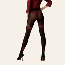 Charger l'image dans la galerie, Collant avec motif fantaisie de couleur bordeaux rouge et beige pour femme disponible en deux tailles différentes.