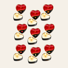 Charger l'image dans la galerie, Achat mini bougie de massage aromatisée aux parfums gourmands. La mini bougie est léchable pour un moments érotique avec votre partenaire de jeu.