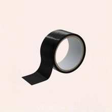 Charger l'image dans la galerie, Tape bondage de couleur noir 15 mètres est parfait pour vos moments SM soft avec votre partenaire.