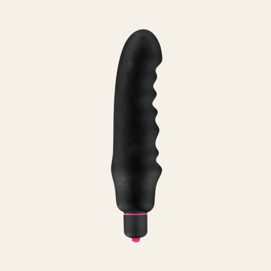 Mini vibromasseur Chubbie de couleur noir et rose très puissant.