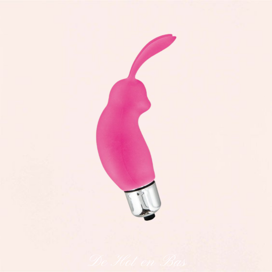 Le mini stimulateur Rabbit de couleur rose vous caressera votre clitoris avec ses deux grandes oreilles.
