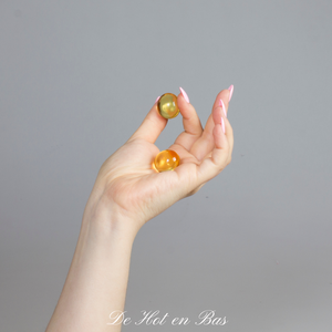 Voici des petites boules magiques, une fois au contact de la chaleur de votre main, elles se transforment en huile de massage chauffante.