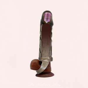 La gaine de pénis est confortable. Vous pouvez la mettre sur le sexe et l'accrocher avec le cockring au niveau des testicules.