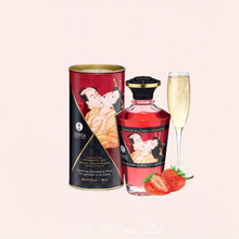 Charger l&#39;image dans la galerie, Huile de massage chauffante aphrodisiaque comestible parfum et goût Vin pétillant à la fraise de la marque Shunga à petit prix.
