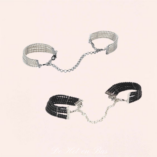 Vente de nos magnifiques menottes bracelets en perles de nacres blanches ou noires de la marque Bijoux Indiscrets.