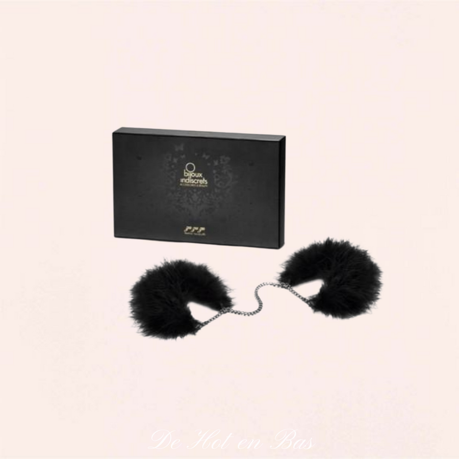 Menottes en fourrure et plumes de haute qualité pour femme.