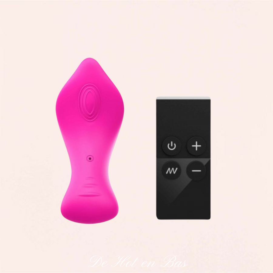 Le stimulateur clitoridien puissant dispose d'un télécommande noire design pour le contrôler à distance.